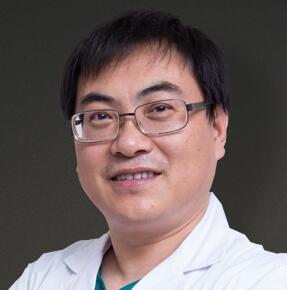 薛启明